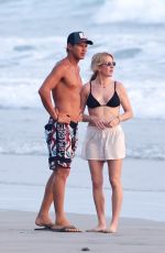 ELLIE GOULDING and Armando Perez on Vacation in Costa Rica 03/27/2024