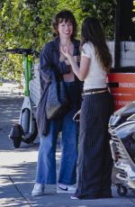 MILLA JOVOVICH and Her Daughter EVER ANDERSON Leaves Chateau Marmont in Los Angeles 04/17/2024