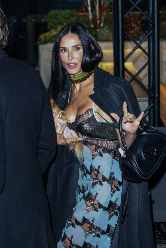 DEMI MOORE Arrives at Gucci Cruise 2025 Fashion Show at Tate Modern in London 05/13/2024