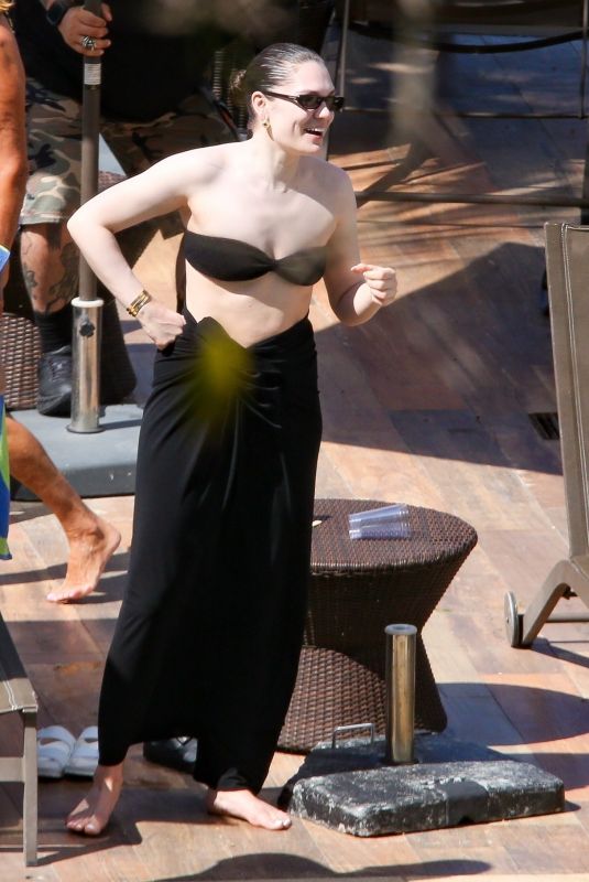 JESSIA J at Her Hotel’s Pool in Rio 05/03/2024
