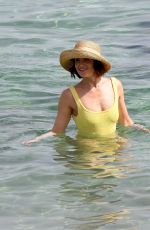 GEMMA ARTERTON in a Yellow Swimsuit at a Beach in Italy 06/24/2024