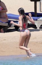 LENI KLUM in Bikini on the Beach in Sardinia 06/26/2024