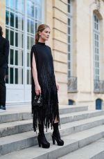ROSAMUND PIKE Arrives aat Dior Fall 2024 Couture Show in Paris 06/24/2024