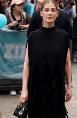 ROSAMUND PIKE Arrives aat Dior Fall 2024 Couture Show in Paris 06/24/2024