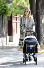 SUKI WATERHOUSE Out with Her Baby in Los Angeles 06/17/2024