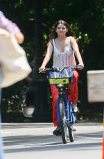 SURI CRUISE Out Biking at Central Park in New York 06/08/2024